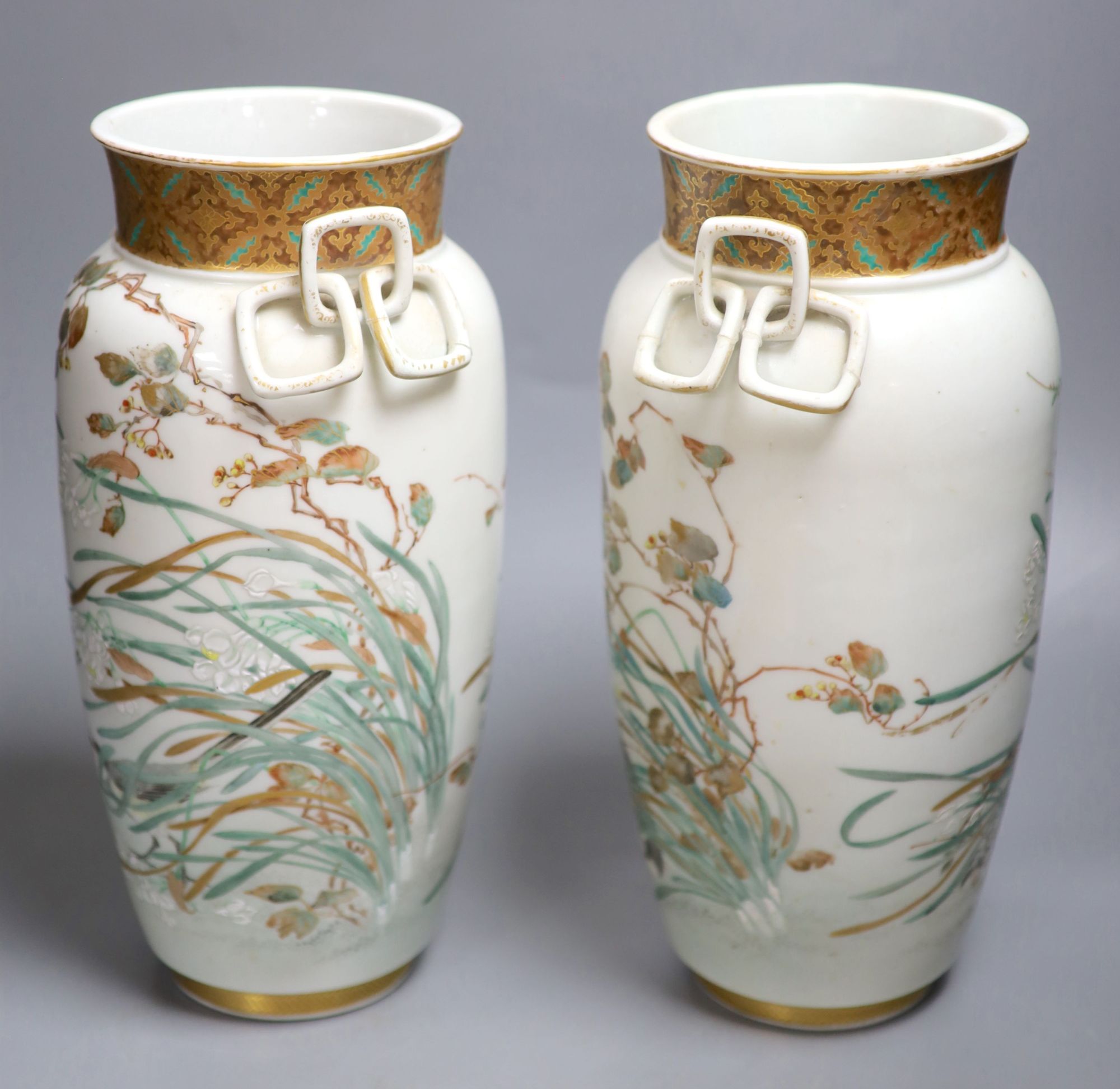 A pair of rare Japanese ceramic vases, signed Tokyo Houen, Meiji period, height 33cm